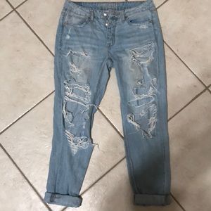 Very distressed Tomgirl jeans